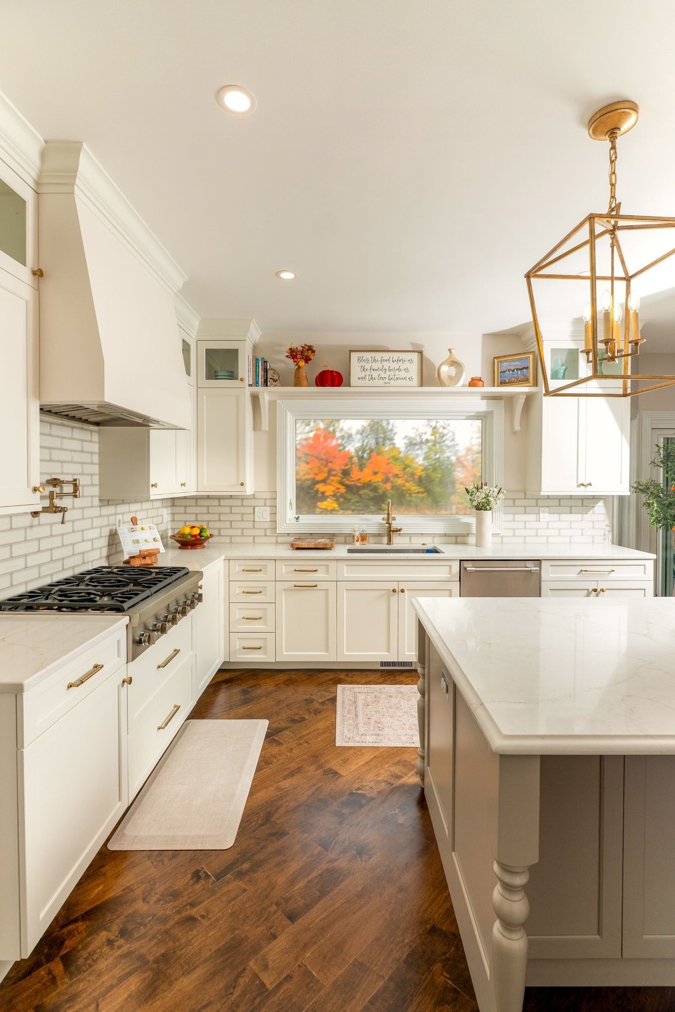 modern neutral kitchen remodel in aurora ohio with white cabinets and hardwood floors
