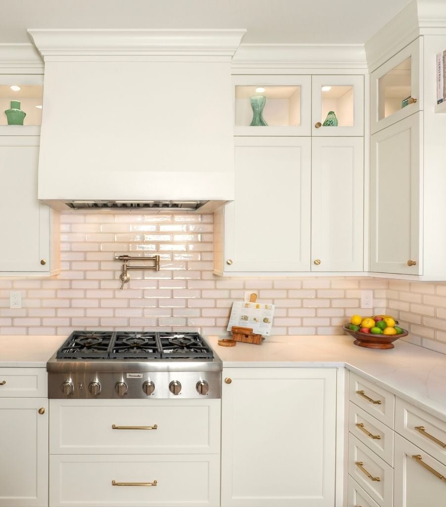 white kitchen remodel with custom lit cabinets