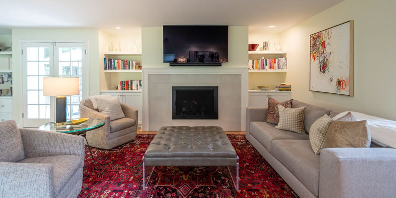 Home remodel in Cleveland with cozy living room and stone fireplace