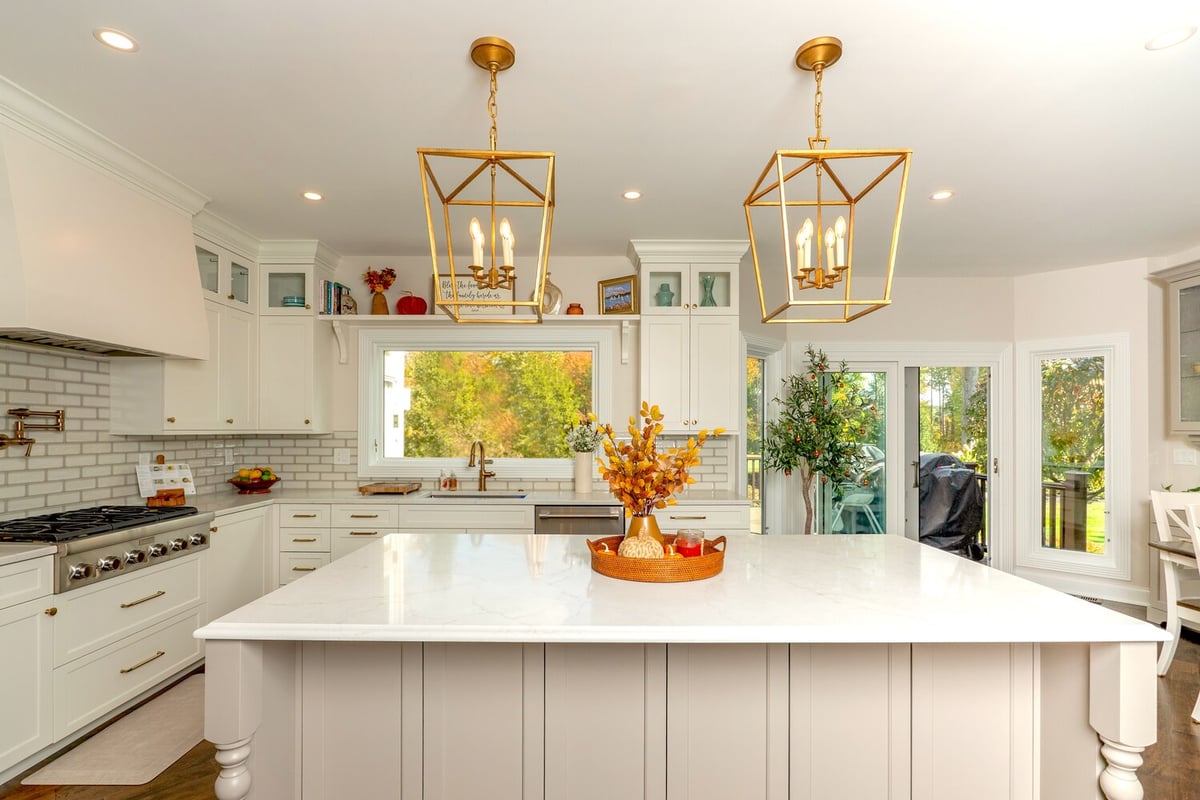 kitchen remodel with large island and gold pendant lighting by Chagrin River Company in Shaker Heights, OH