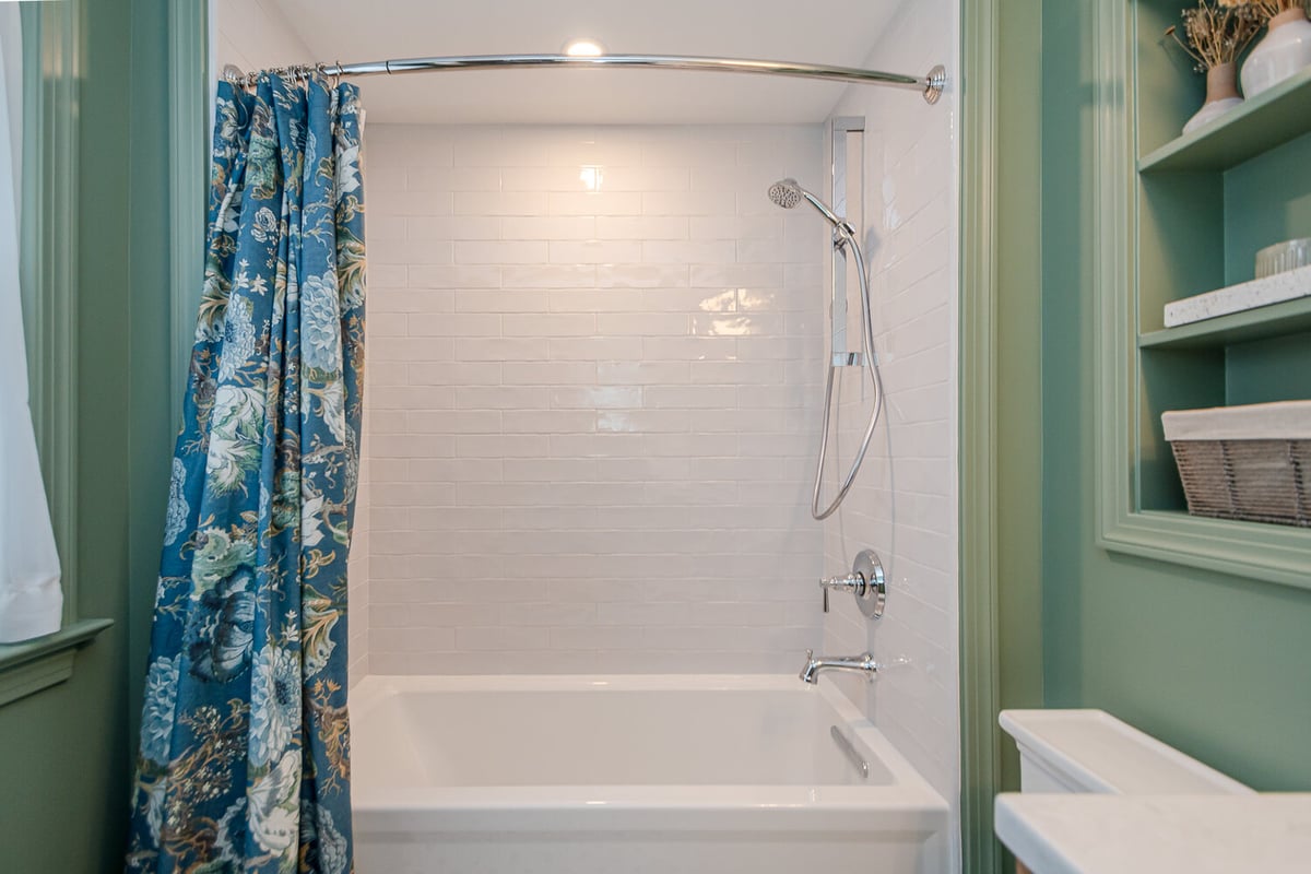 Shaker Heights, OH custom home bathroom built by Chagrin River Company featuring bathtub with chrome fixtures.
