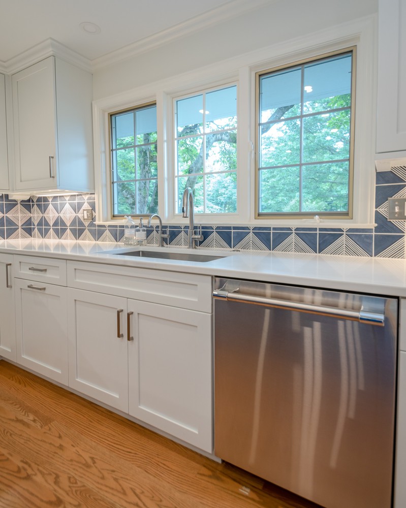 custom home kitchen by Chagrin River Company in Pepper Pike, OH featuring built-in refrigerator and coffee station.