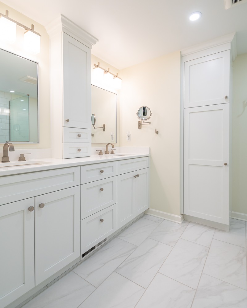 detailed custom home bathroom cabinetry in Pepper Pike, OH by Chagrin River Company with shaker drawers and brushed hardware.