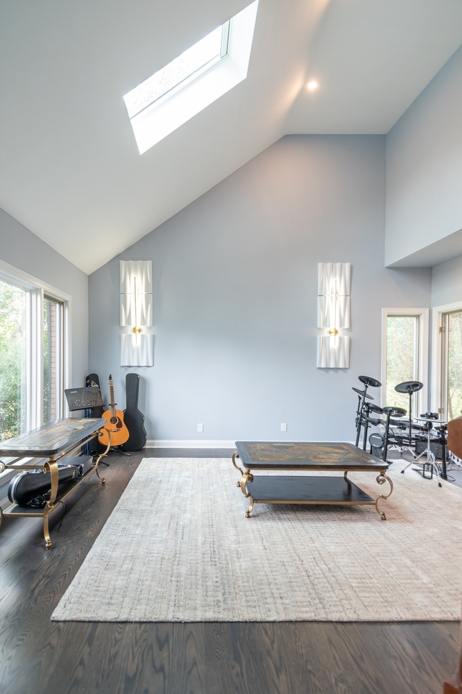 Solon, OH custom home music room with vaulted ceiling by Chagrin River Company