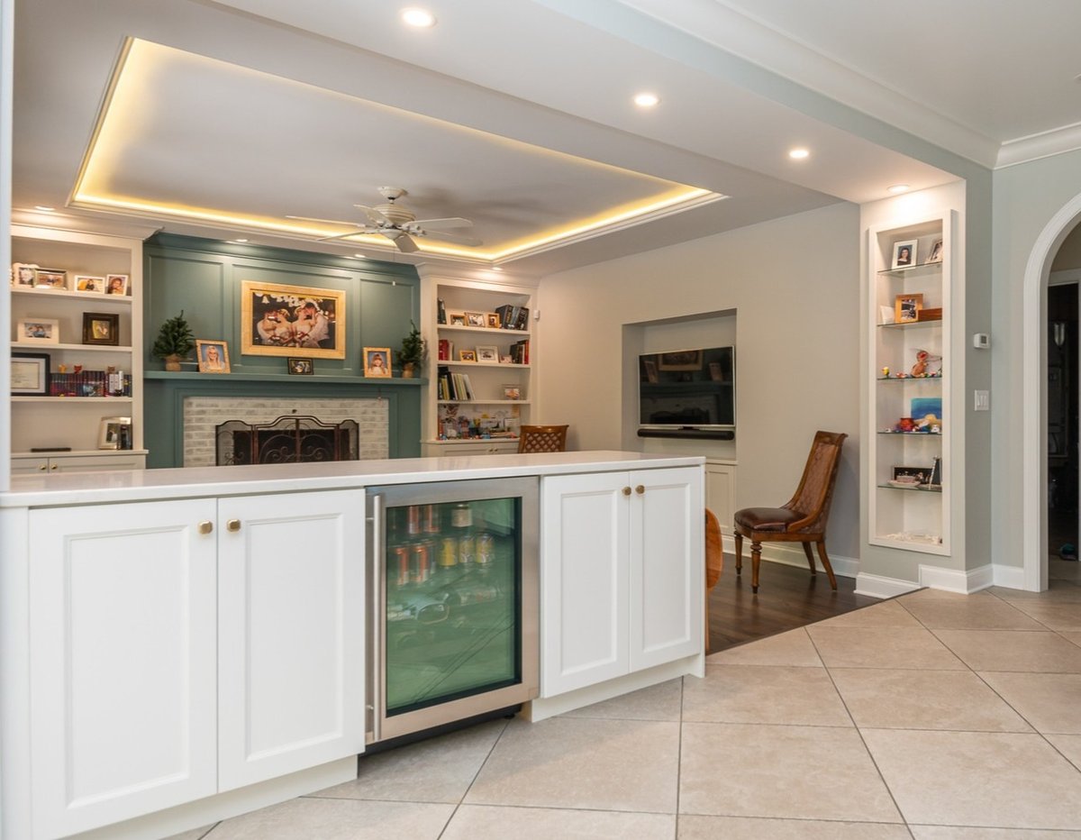 custom home bar area with beverage fridge by Chagrin River Company in Solon, OH