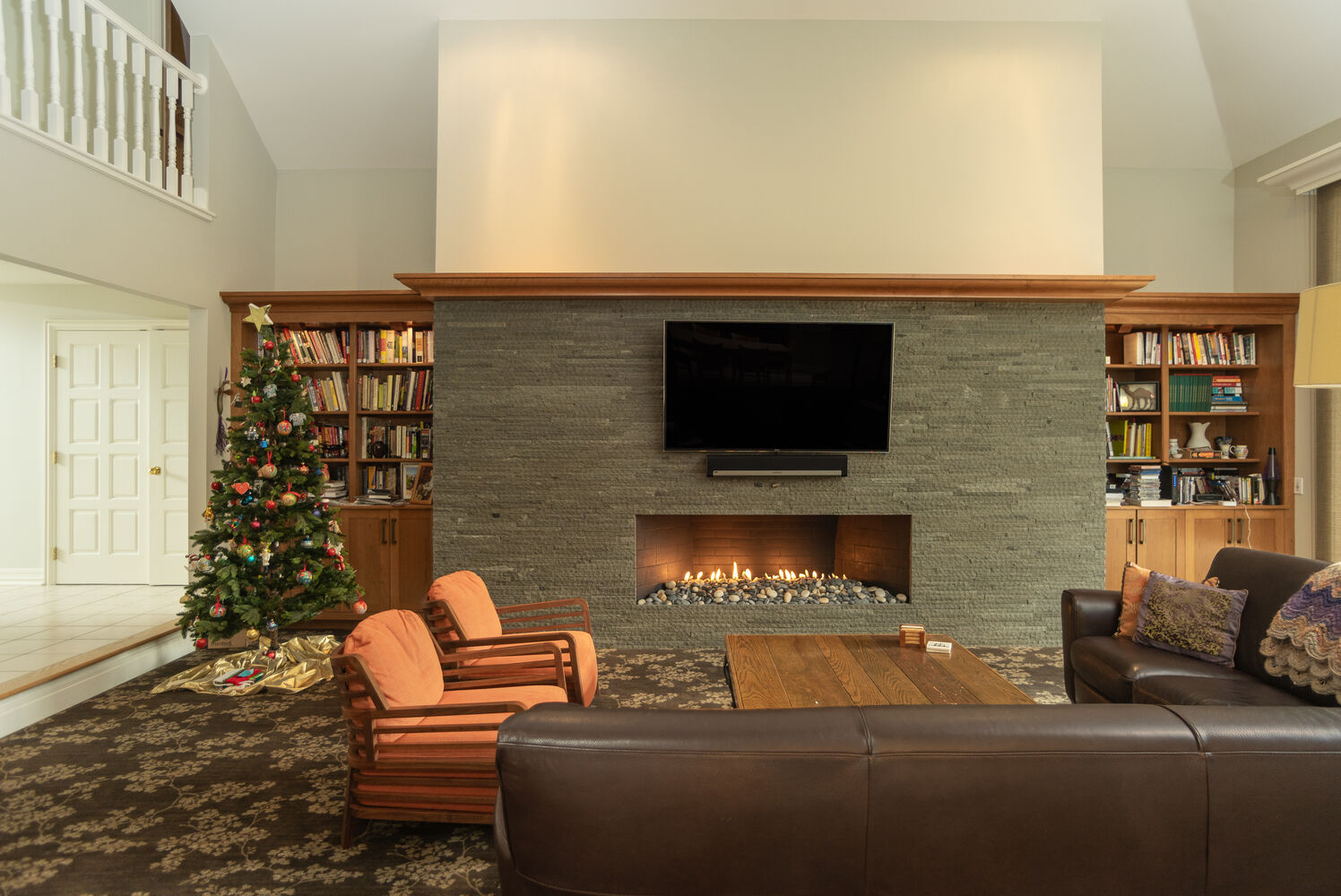 custom home living room with modern fireplace by Chagrin River Company in Chardon, Ohio
