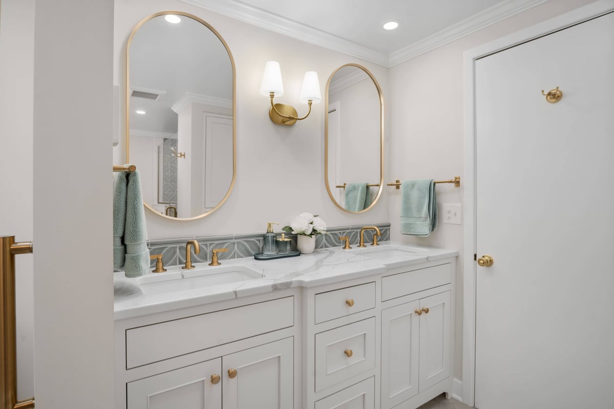 shaker heights primary bathroom remodel custom cabinetry and brass finishes