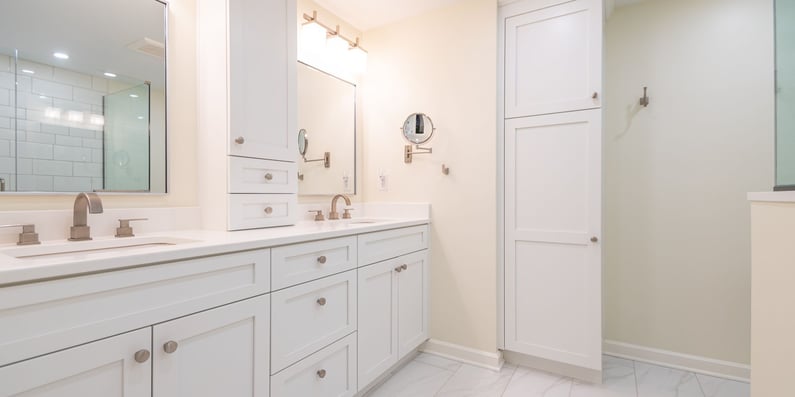 White bathroom remodel in Pepper Pike Ohio with double sink vanity and ample storage