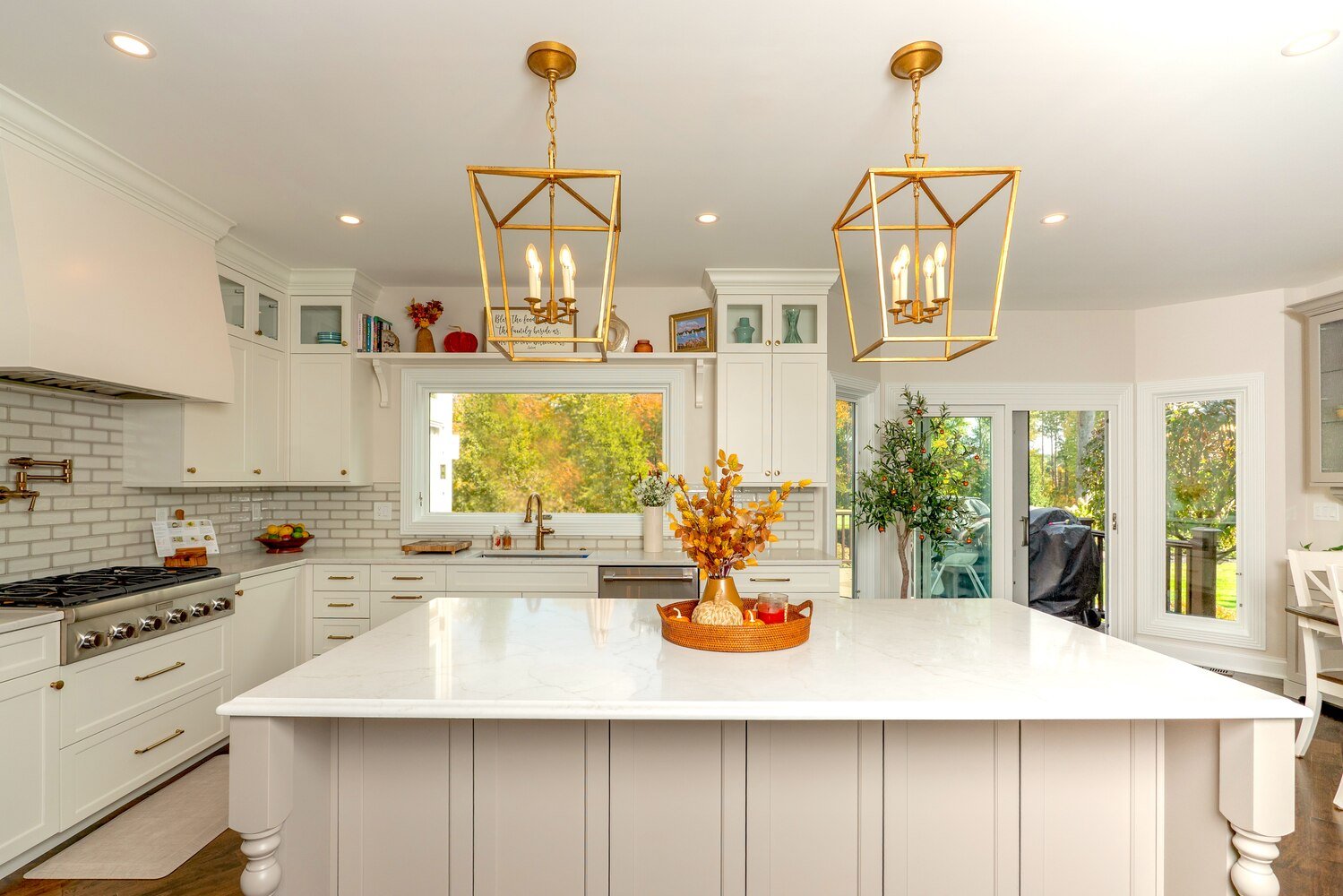 kitchen remodel with large island and gold pendant lighting by Chagrin River Company in Shaker Heights, OH