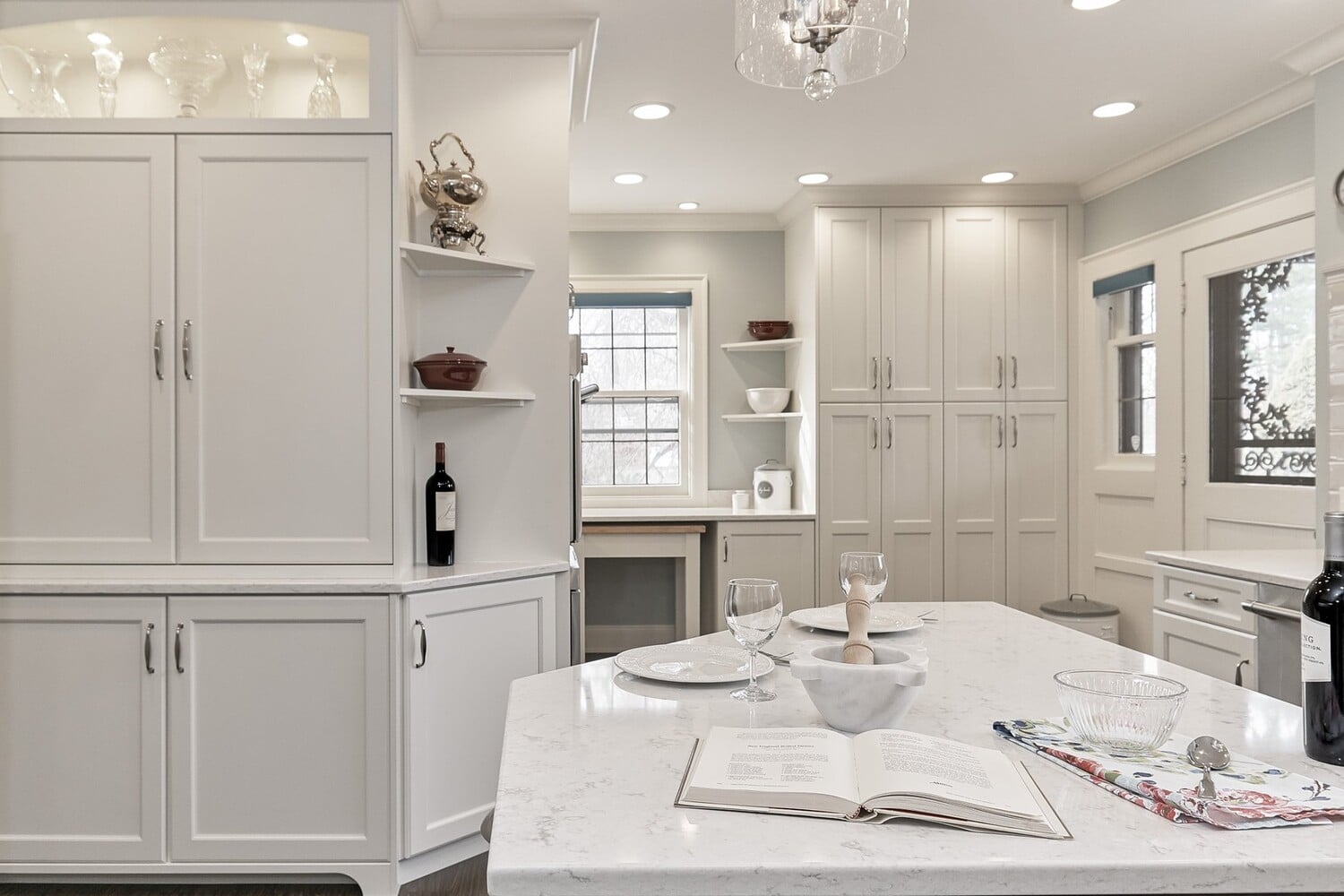 kitchen remodel with marble island and seating area by Chagrin River Company in Bainbridge, OH